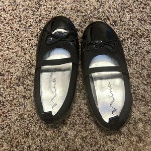 Black leather slippers